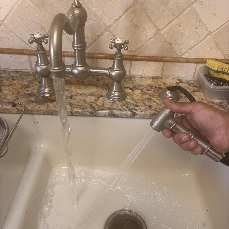 Faucet sprayer hose and cartridge replacement in kitchen sink