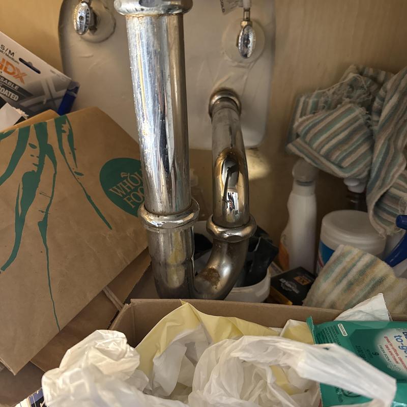 Kitchen sink drain pipes with clog removal tools