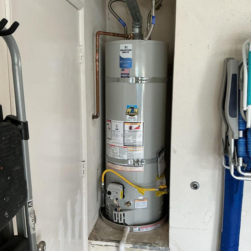 Natural gas water heater with copper piping installation