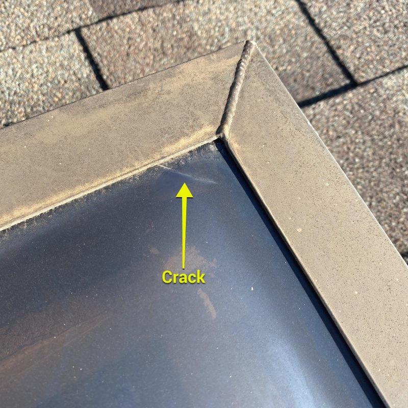 Skylight dome with visible crack in corner