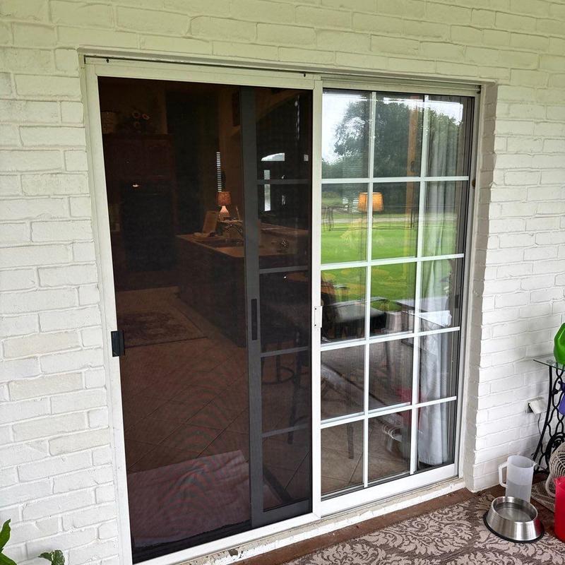 Vinyl sliding glass door with low E tempered glass