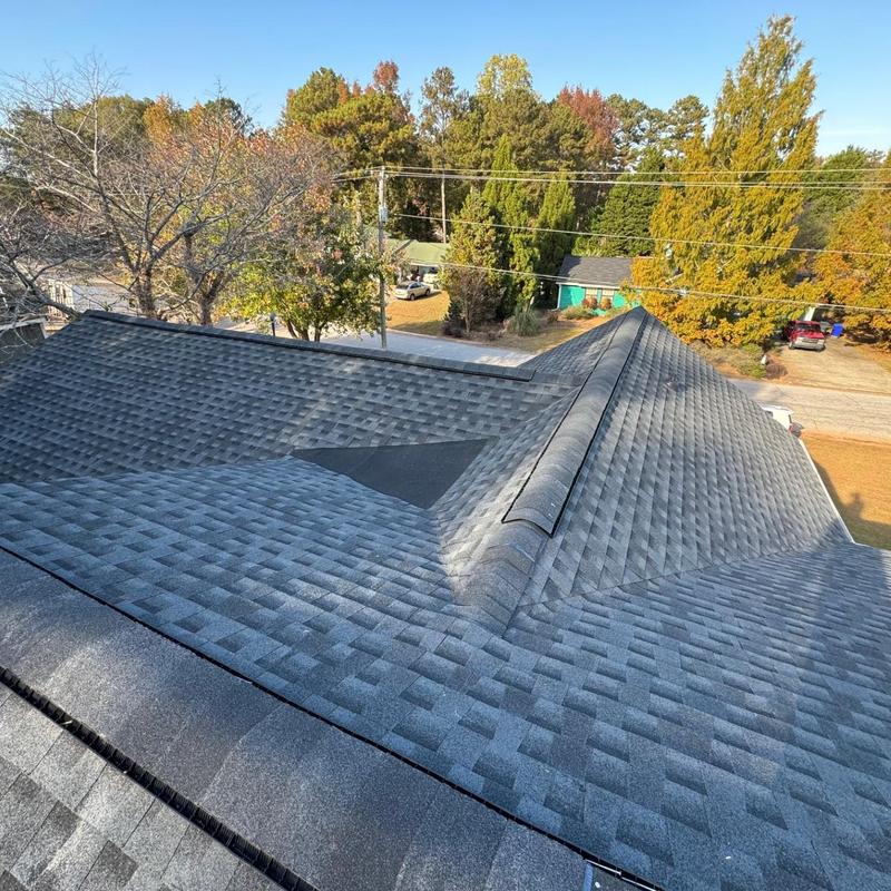 Asphalt shingle roof replacement with ridge caps Asphalt shingle roof replacement with ridge caps