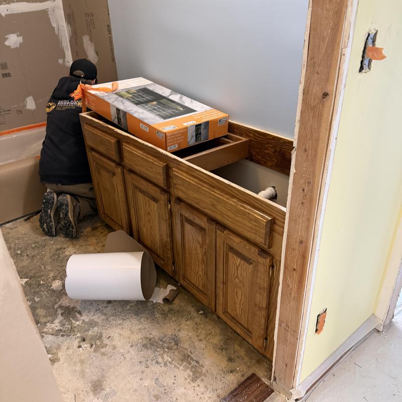 Cabinets and baseboard refinishing in bathroom Cabinets and baseboard refinishing in bathroom