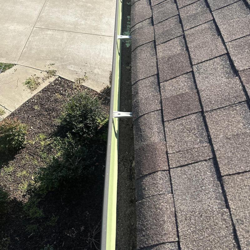 Roof shingles and gutter inspection with hail damage