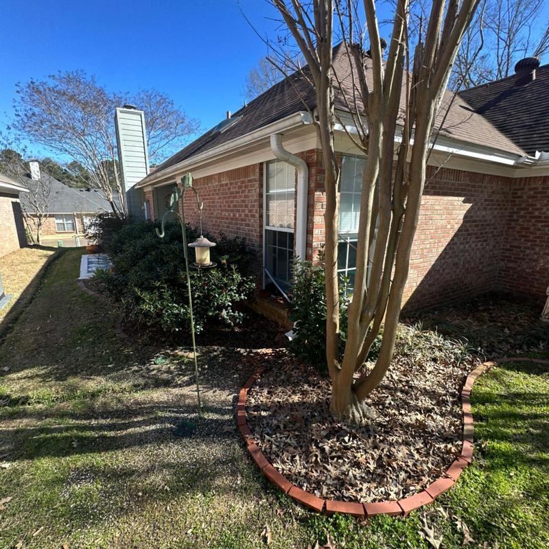 Gutter system and roof edge inspection on brick house Gutter system and roof edge inspection on brick house