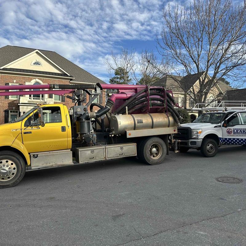 Vac truck equipment parked near residential homes Vac truck equipment parked near residential homes