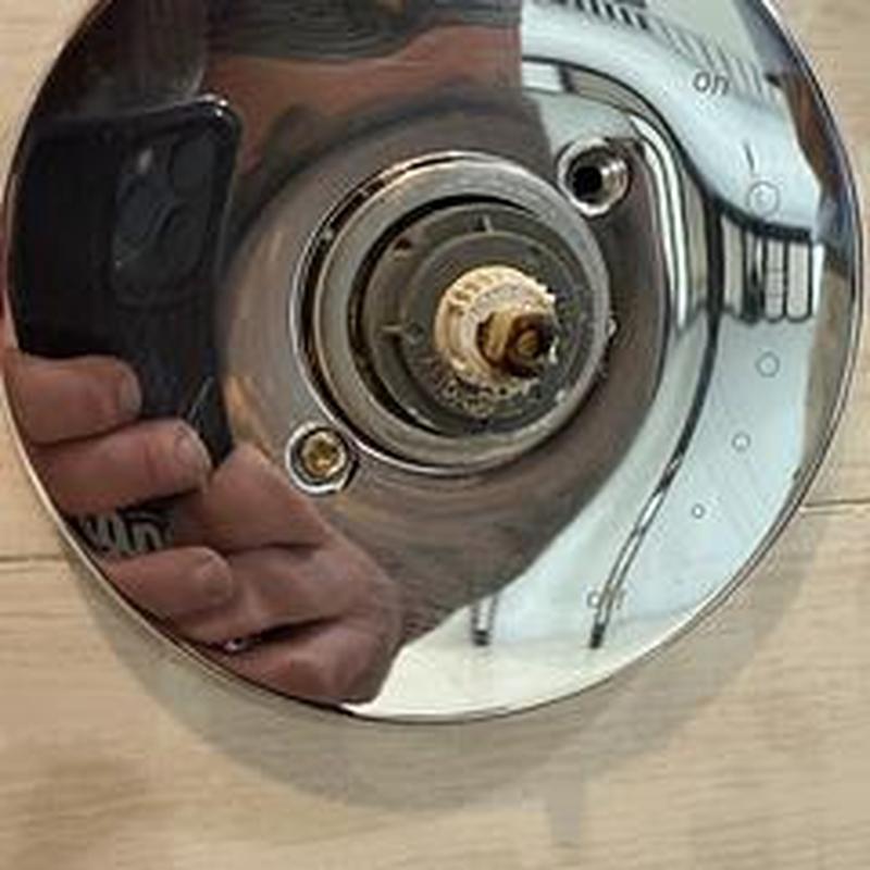 Delta cartridge valve with removed integral stop in wall