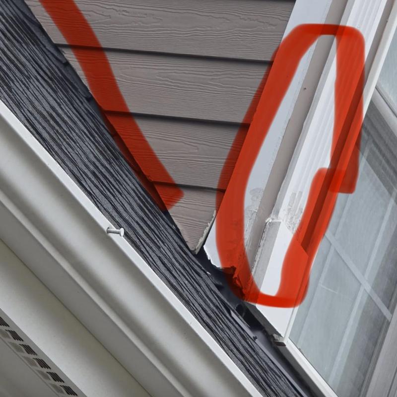 Window trim with rotted wood and flashing corners
