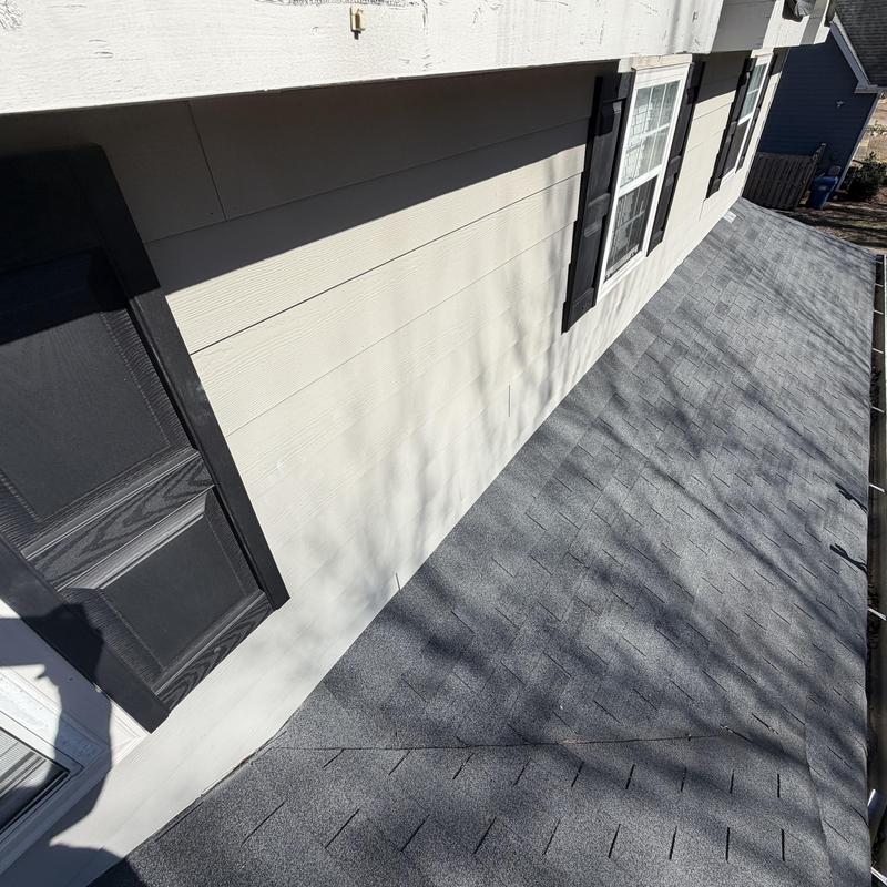 Wall flashing and roof valley inspection on asphalt shingles