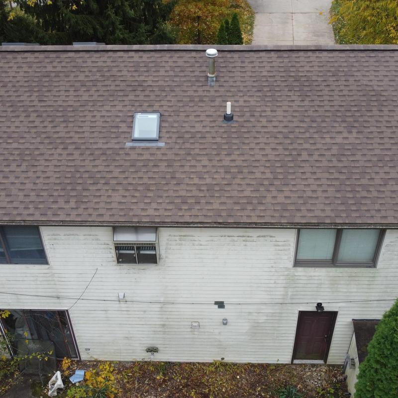Velux skylight with solar blinds on Barkwood roof Velux skylight with solar blinds on Barkwood roof