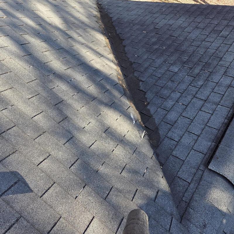 Roof shingles and valley with debris removed