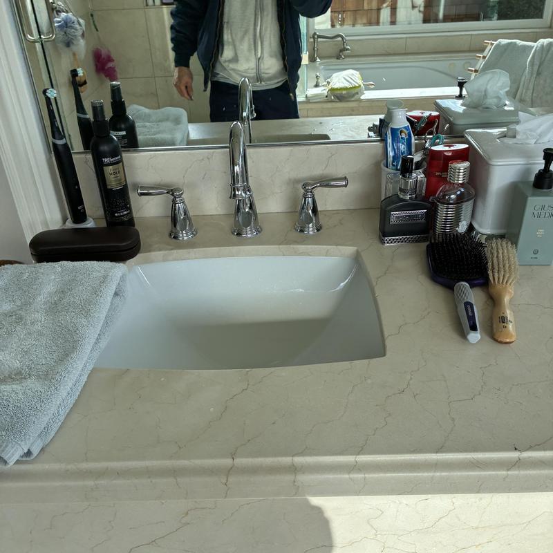 Bathroom sink faucet and shower handle adjustments