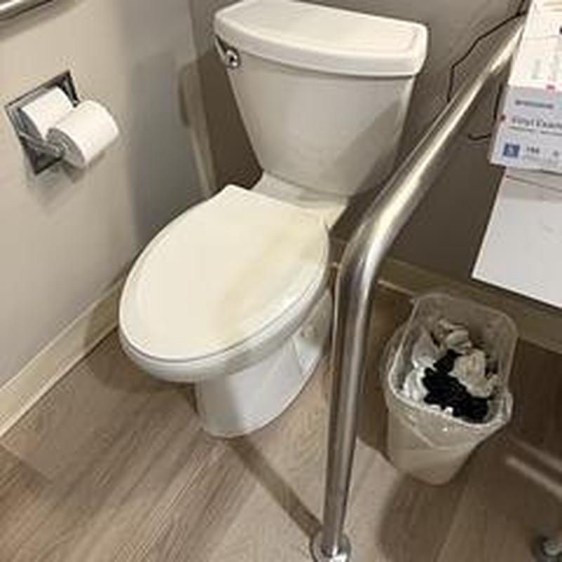 Toilet flange replacement and toilet reset in bathroom