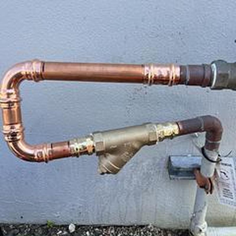 Copper pipe wye strainer installed on backflow inlet