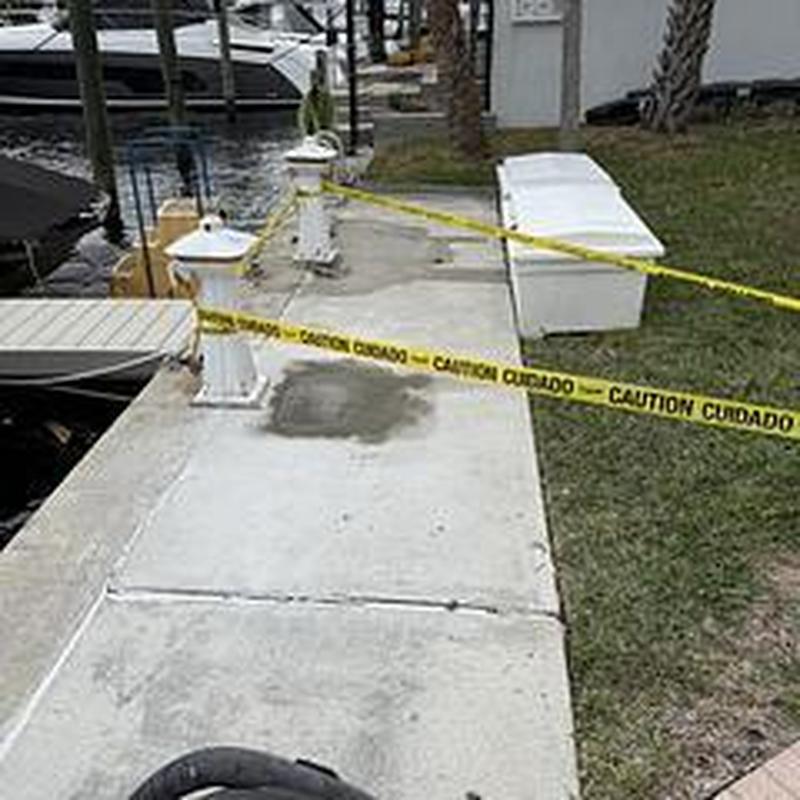 Broken water line repair at dock pedestal with concrete patch