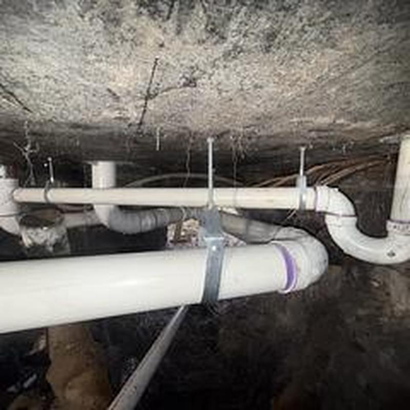 Sch40 PVC sewer pipes with hanger supports under slab