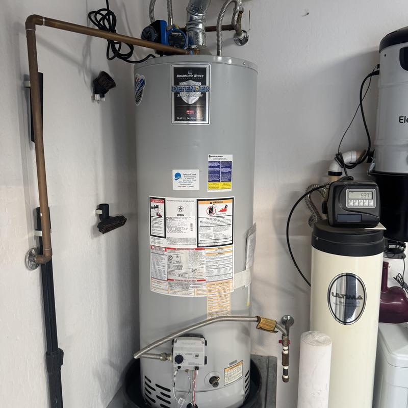 Water heater and filtration system in utility room