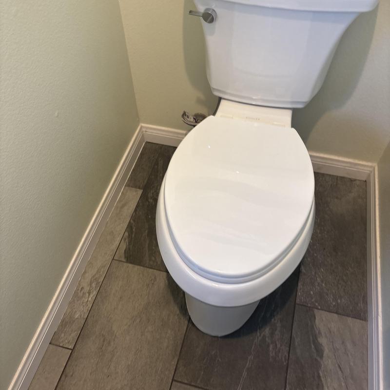 Elongated toilet with new angle stop and supply line Elongated toilet with new angle stop and supply line
