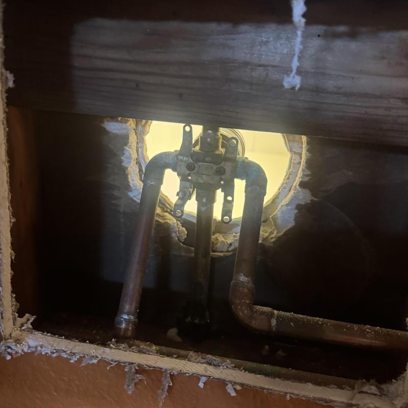 Moen shower valve with copper piping inside wall cavity