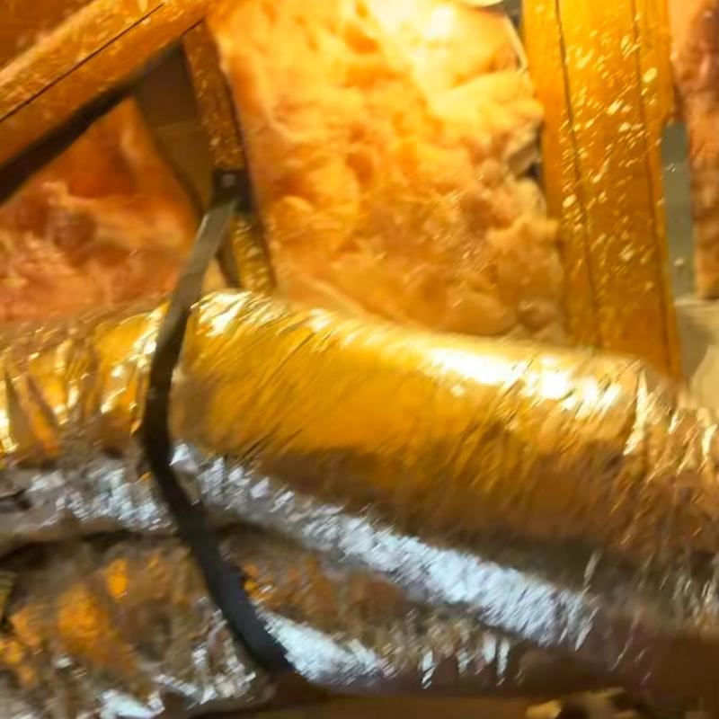 Flexible ductwork installation with attic insulation above