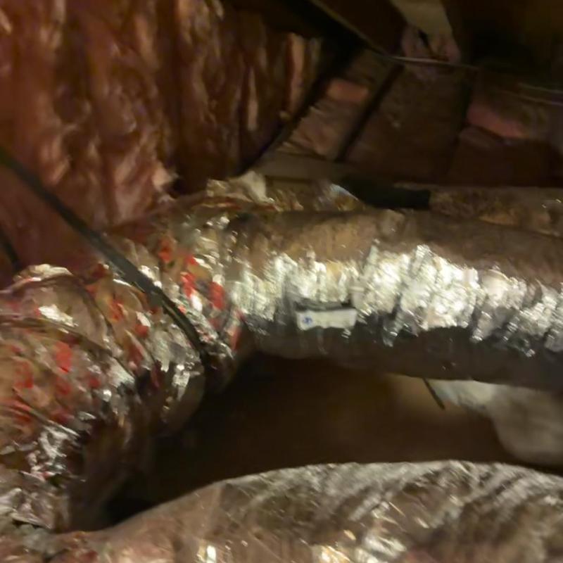 Flexible HVAC duct with insulation in attic space