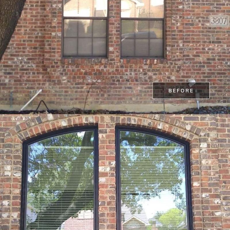 Vinyl arched windows with bronze exterior frames