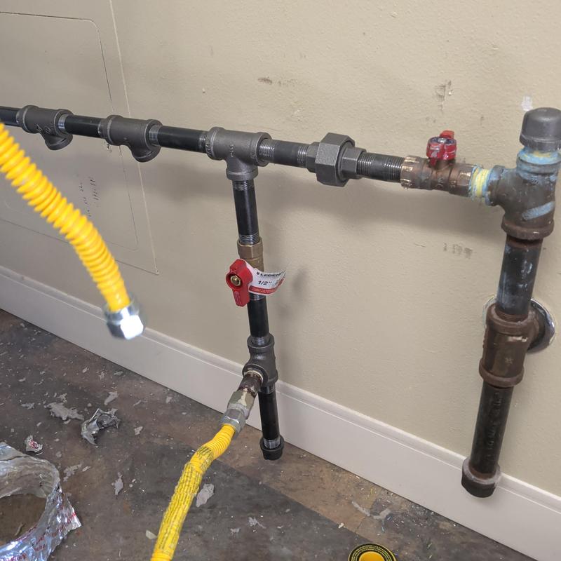 Gas piping with valves and appliance feeds installation