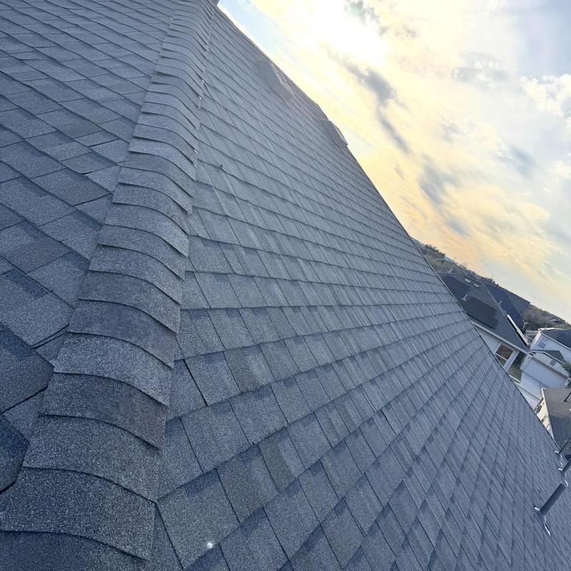 Architectural shingle roof with ridge cap installation