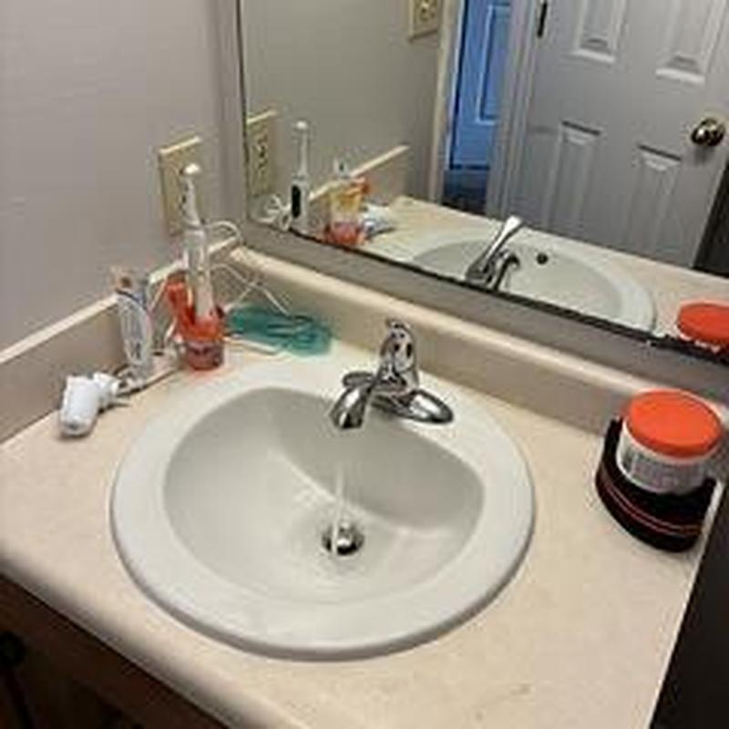 Lavatory bowl with single handle faucet installation