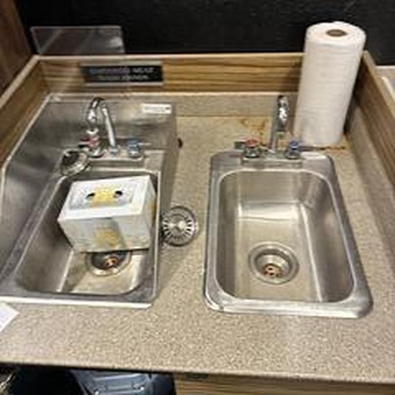 Stainless steel utility sinks with faucets and drainage