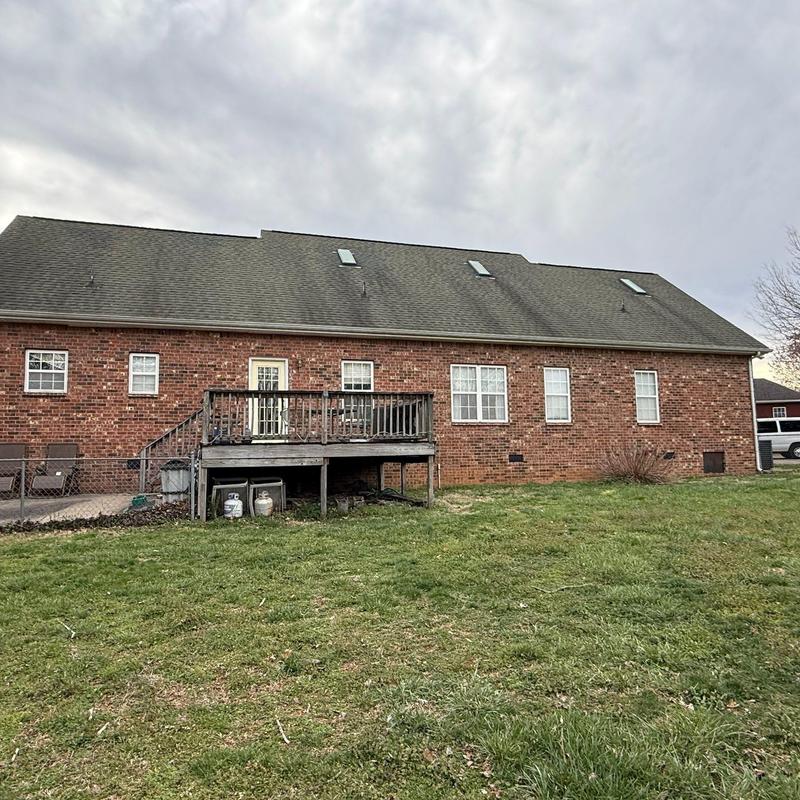 Asphalt shingle roof with skylights and rear deck