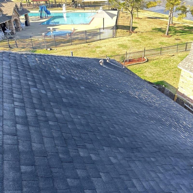Asphalt shingle roof with storm damage inspection
