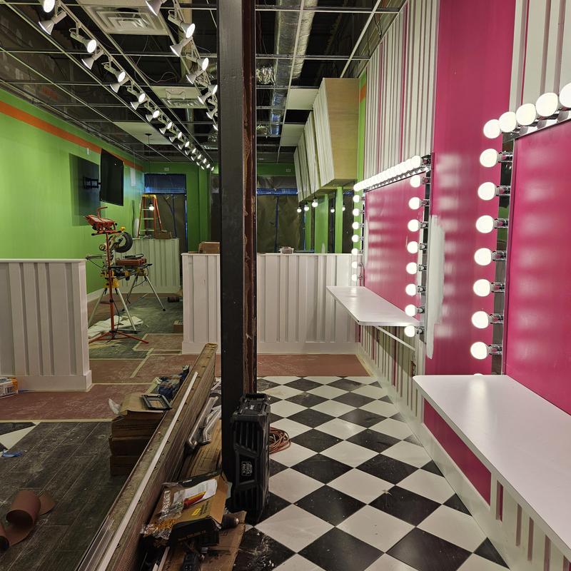 Vanity lighting and black-and-white tile installation Vanity lighting and black-and-white tile installation