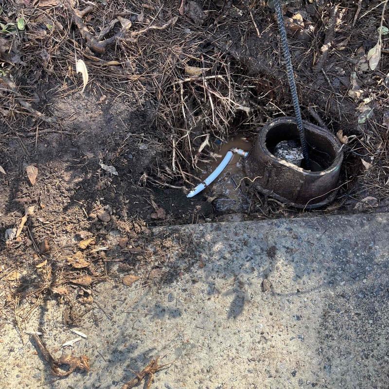 Water valve box and piping excavation near driveway Water valve box and piping excavation near driveway