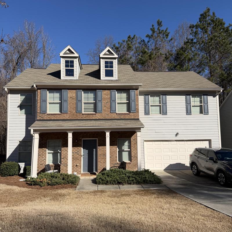3-tab shingle roof with minor window shingle damage