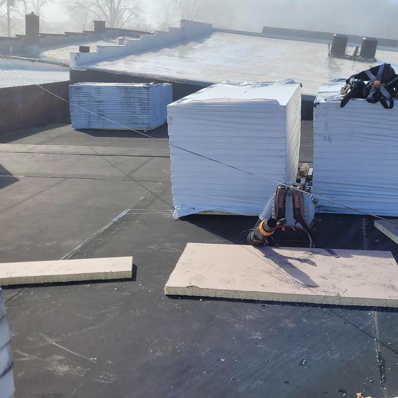 TPO single ply roofing with ISO board insulation stacks