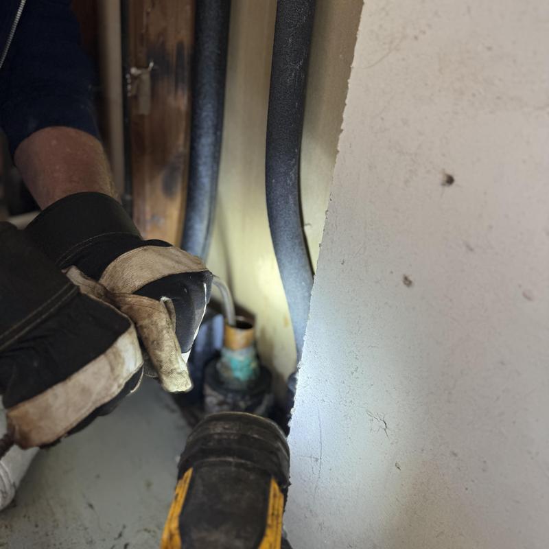 Washer machine drain with plumbing inspection light
