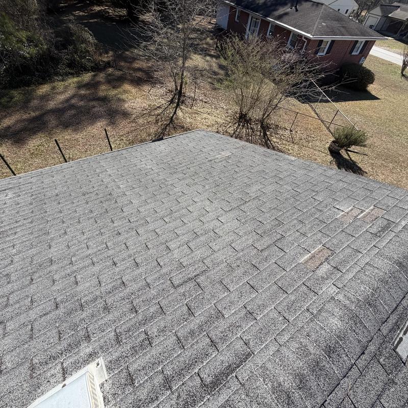 3-tab shingle roof with missing shingles, replacement needed