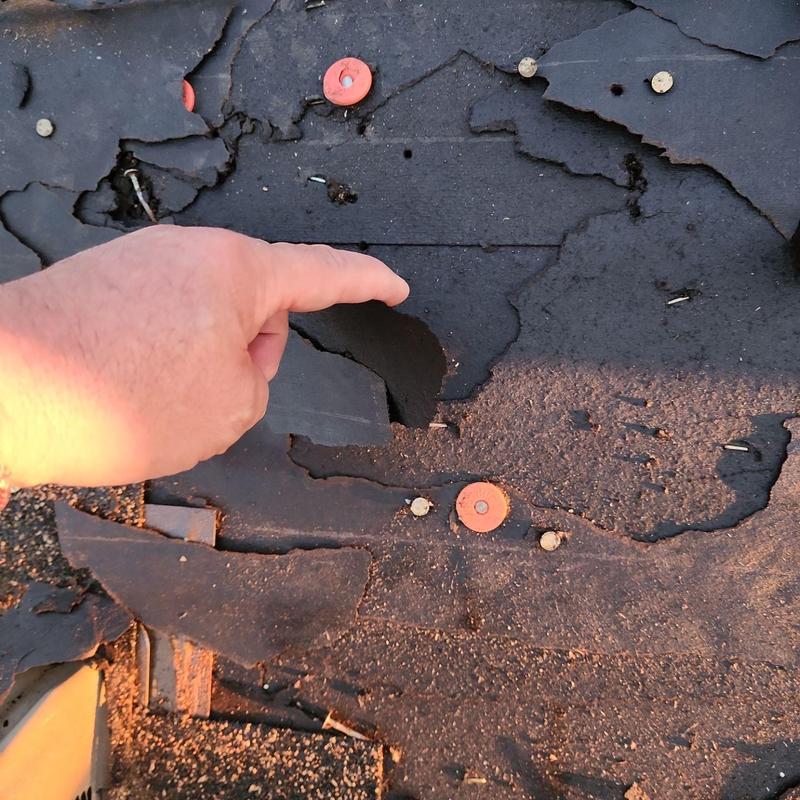 Roofing underlayment with severe cracking and damage Roofing underlayment with severe cracking and damage