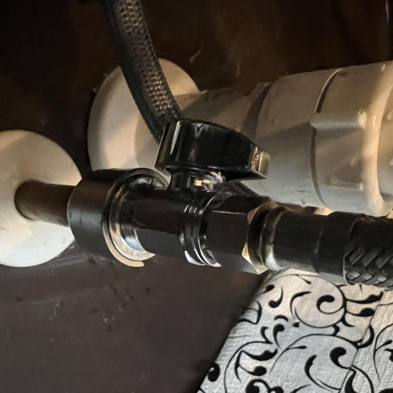 Shut off valve with braided hose connection under sink