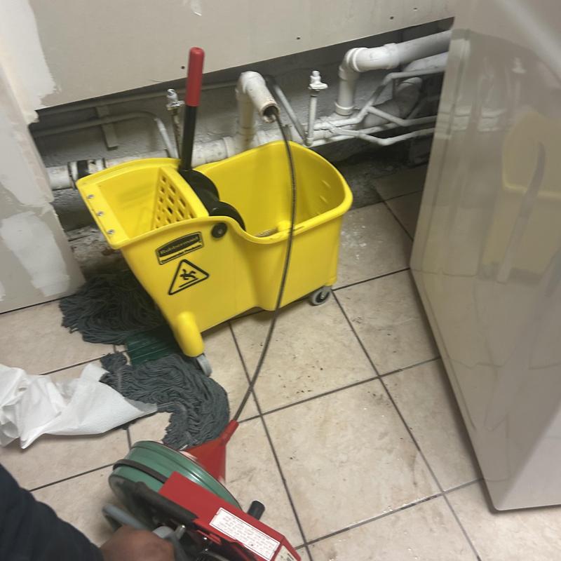 Secondary line slop sink drainage with cleaning tools