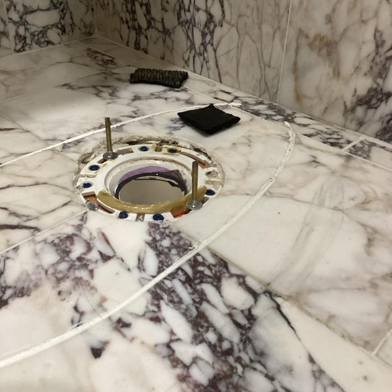 Toilet flange on marble floor installation prep