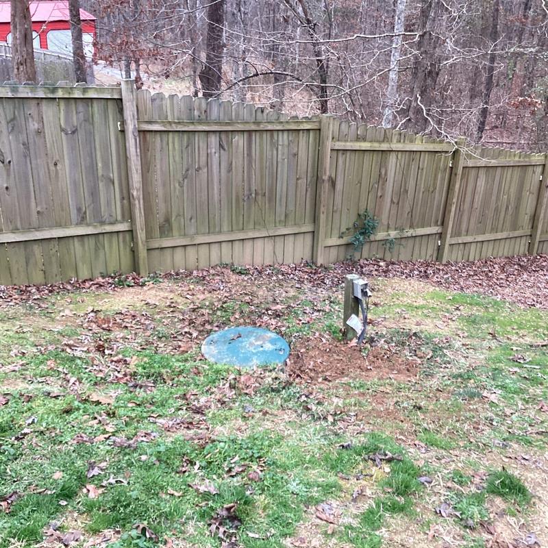 Septic tank pump lid and electrical hookup in yard