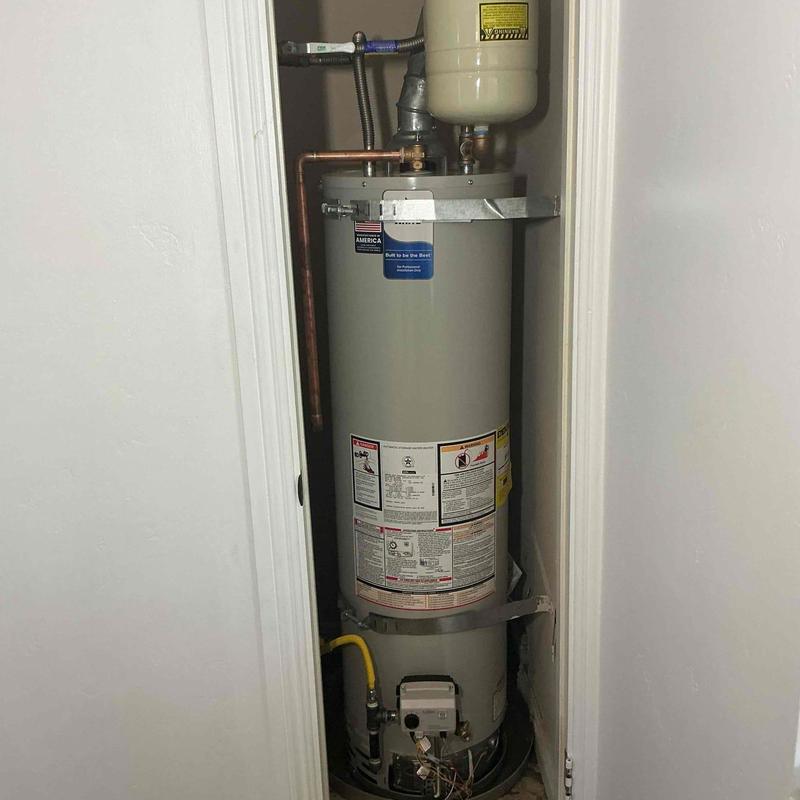 Water heater with expansion tank in closet