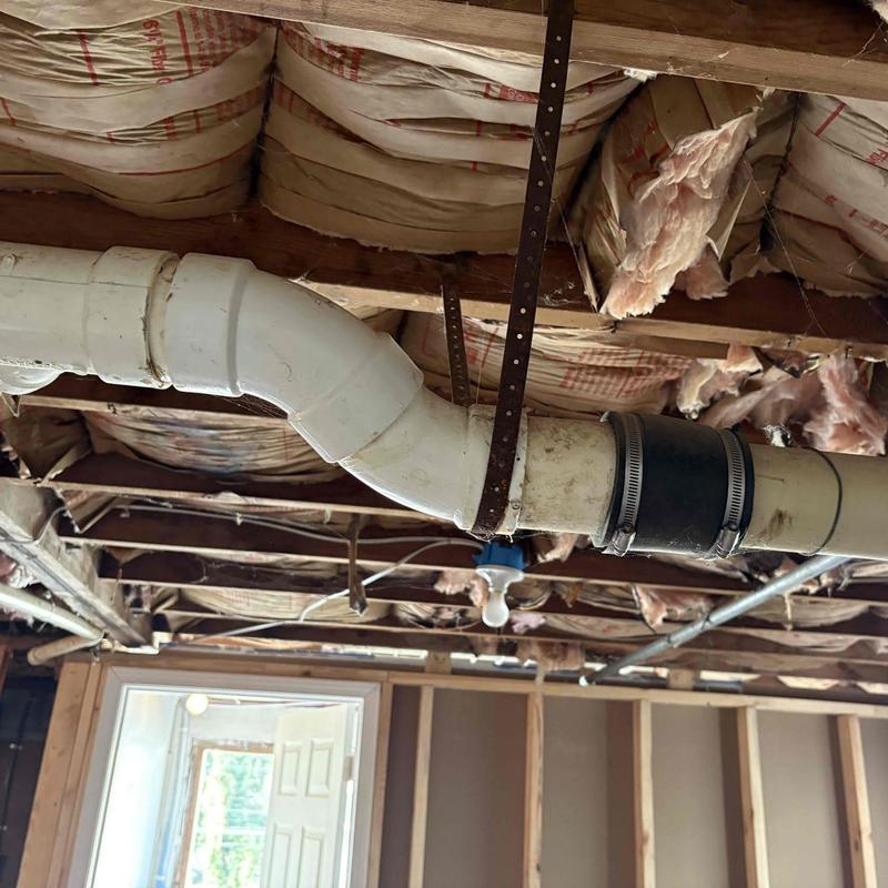 Mainline 3-4 inch PVC pipe with offset 45 and Fernco clamp