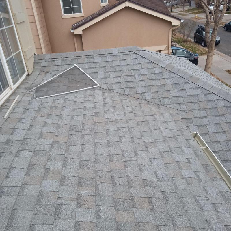 Asphalt shingle roof with hail damage inspection in Commerce City Asphalt shingle roof with hail damage inspection in Commerce City