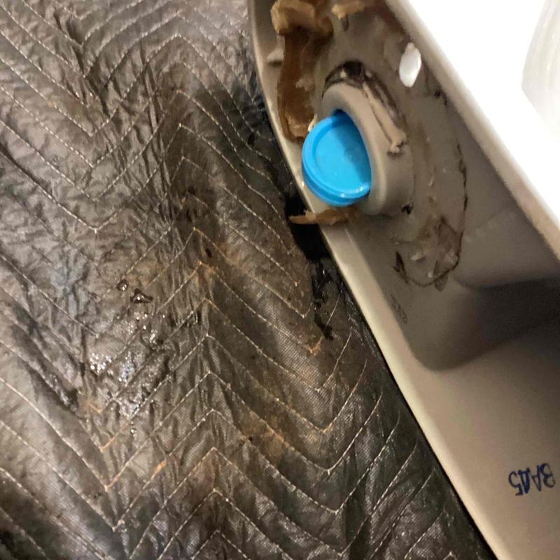 Toilet tank with removed flush valve seal blockages