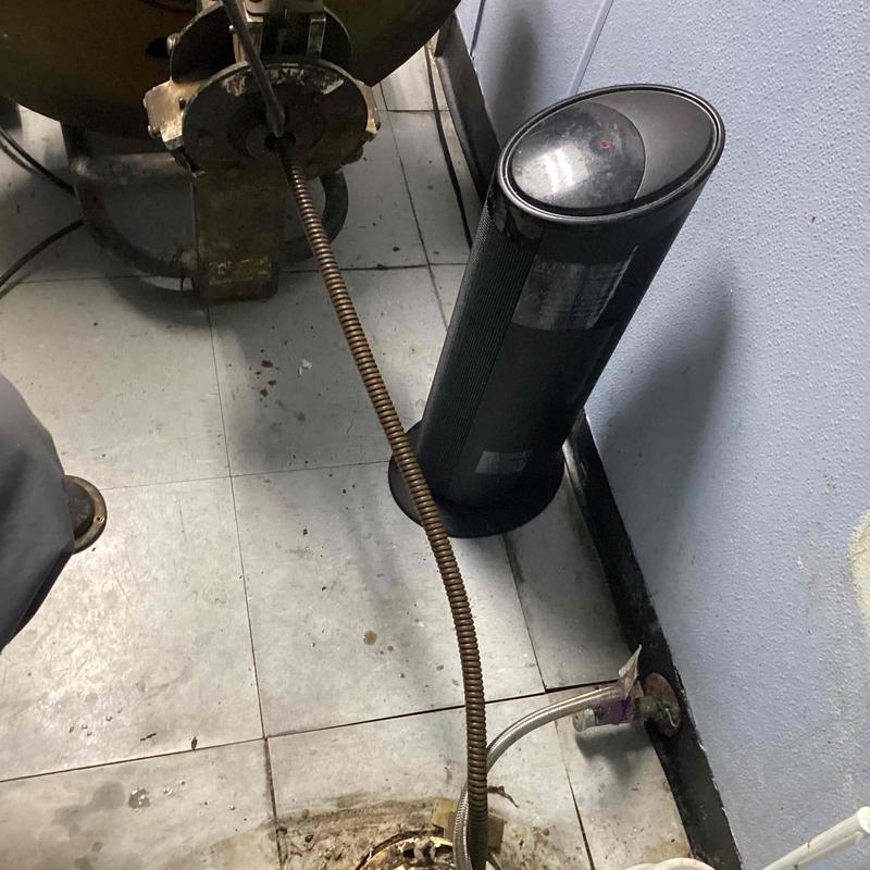 Toilet flange mainline cable with fan nearby