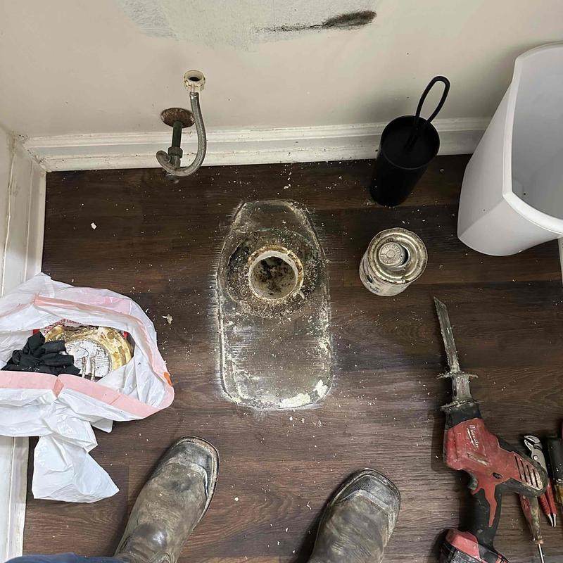 Commode flange replacement on hardwood floor