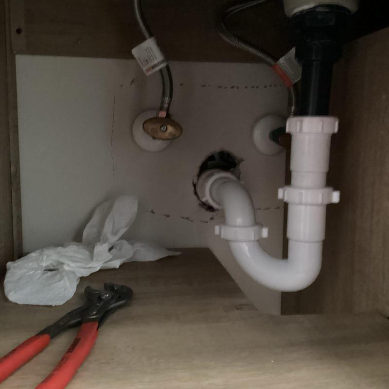 Lavatory drain pipe installation under vanity